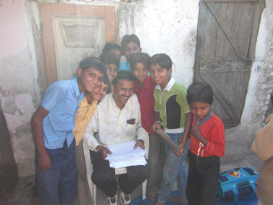 VOLUNTEERS WITH THE CHILDREN