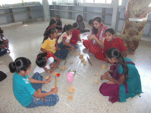 CHILDREN ATTENDING HANDICRAFT CLASSES