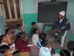 VOLUNTEERS TAKING VALUE-EDUCATION CLASSES FOR CHILDREN