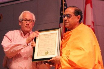 1. Swami Yuktatmananda Receiving Vivekananda Landing Proclamation