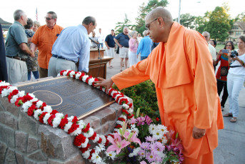 8. Swami Studying Plaque