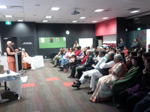 Audience listening to Sw.Tyagananda Kenmore Library